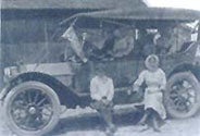 People on a vehicle in 1925